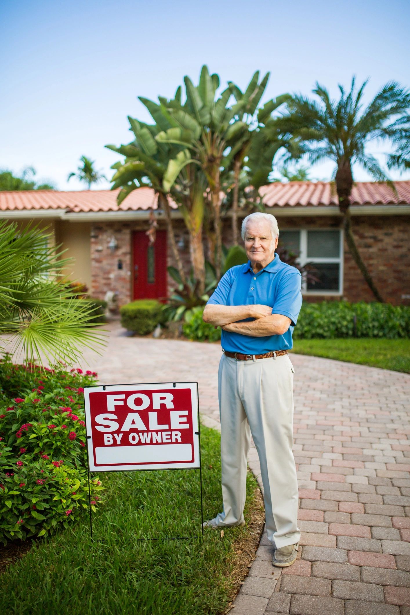 Happy homeowner ready to contact Freedom Home Investors