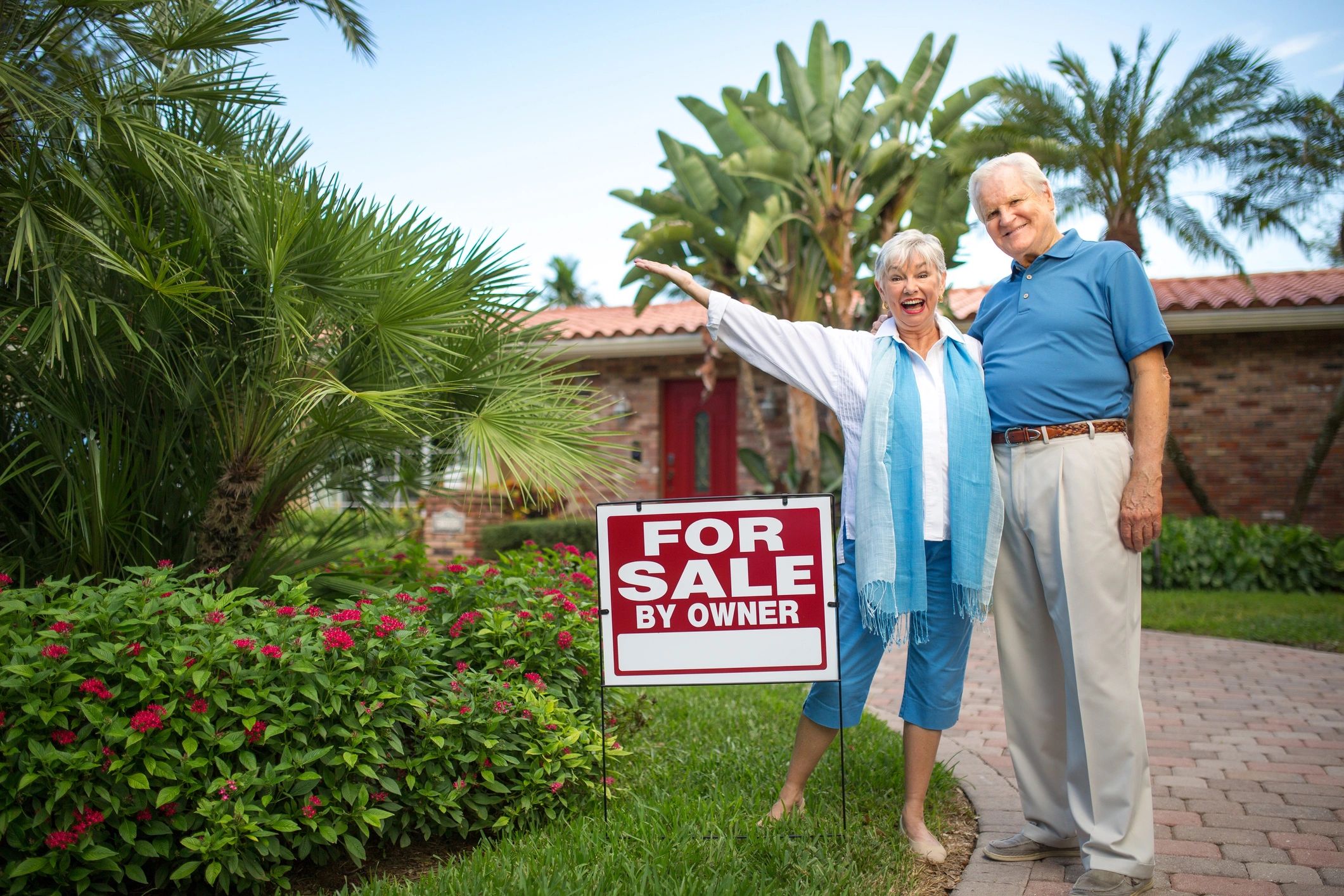 Happy Florida homeowner celebrating a fast house sale